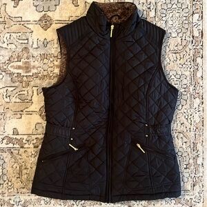 Black quilted puffer vest size medium